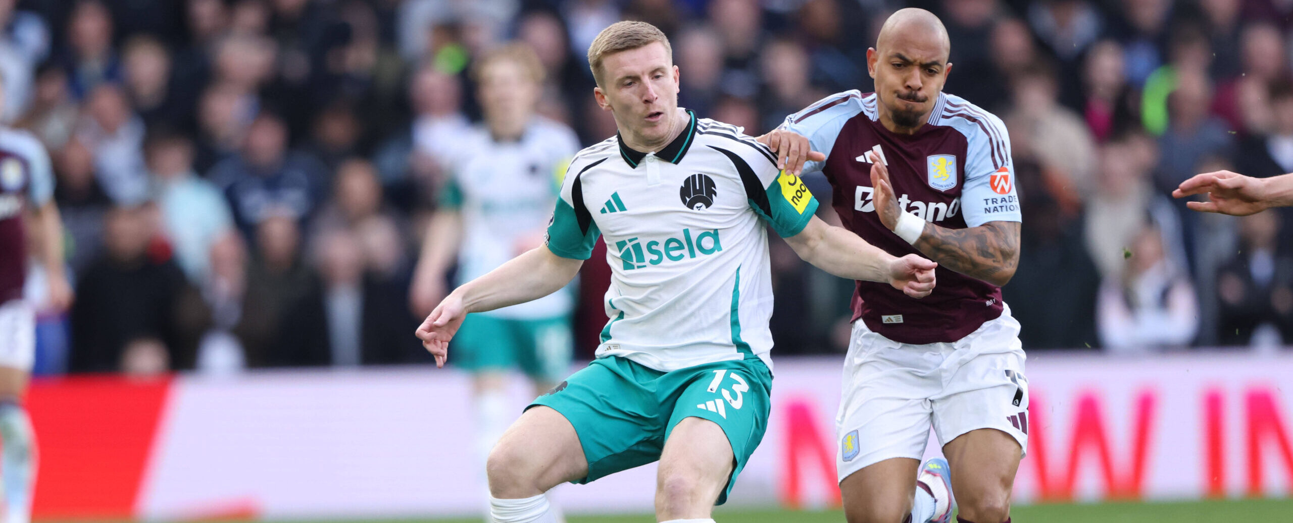 Matt Targett in action for Newcastle United against his former club Aston Villa in 2025
