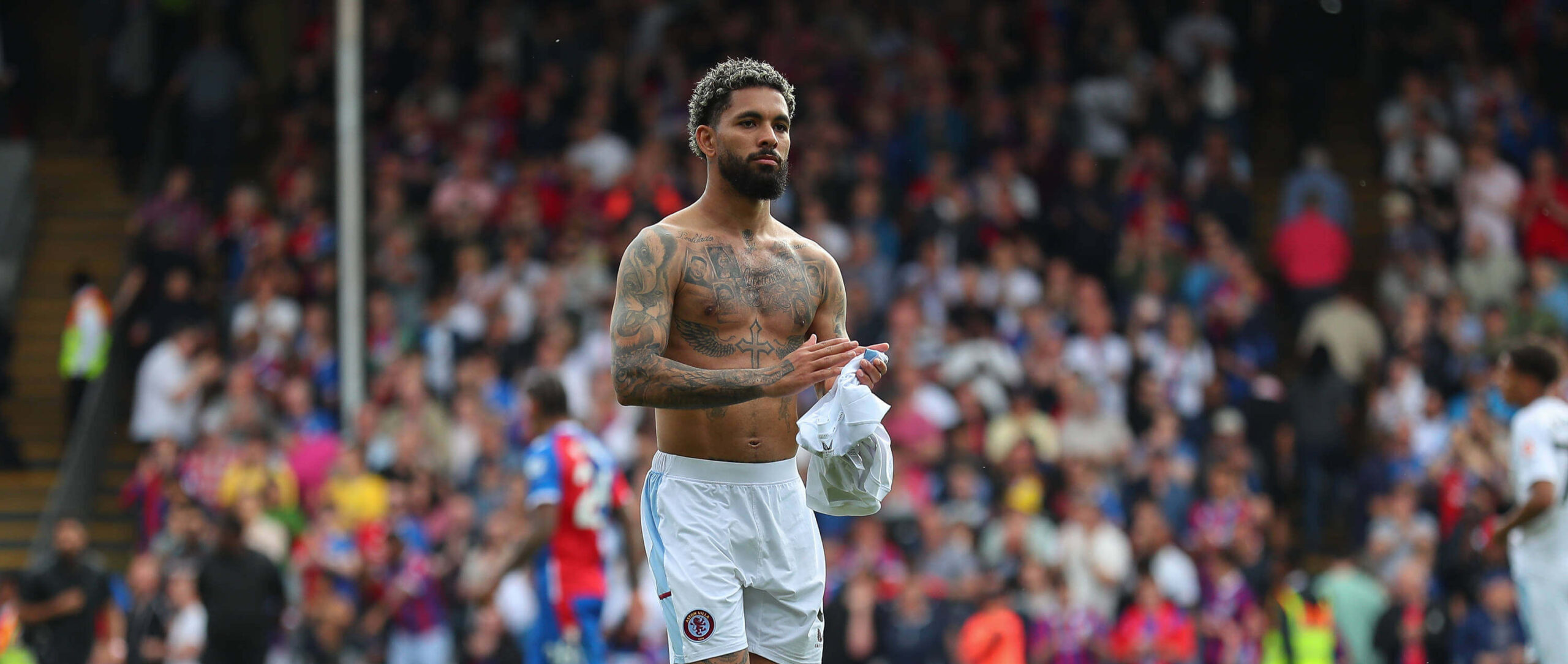 Douglas Luiz In action for Aston Villa