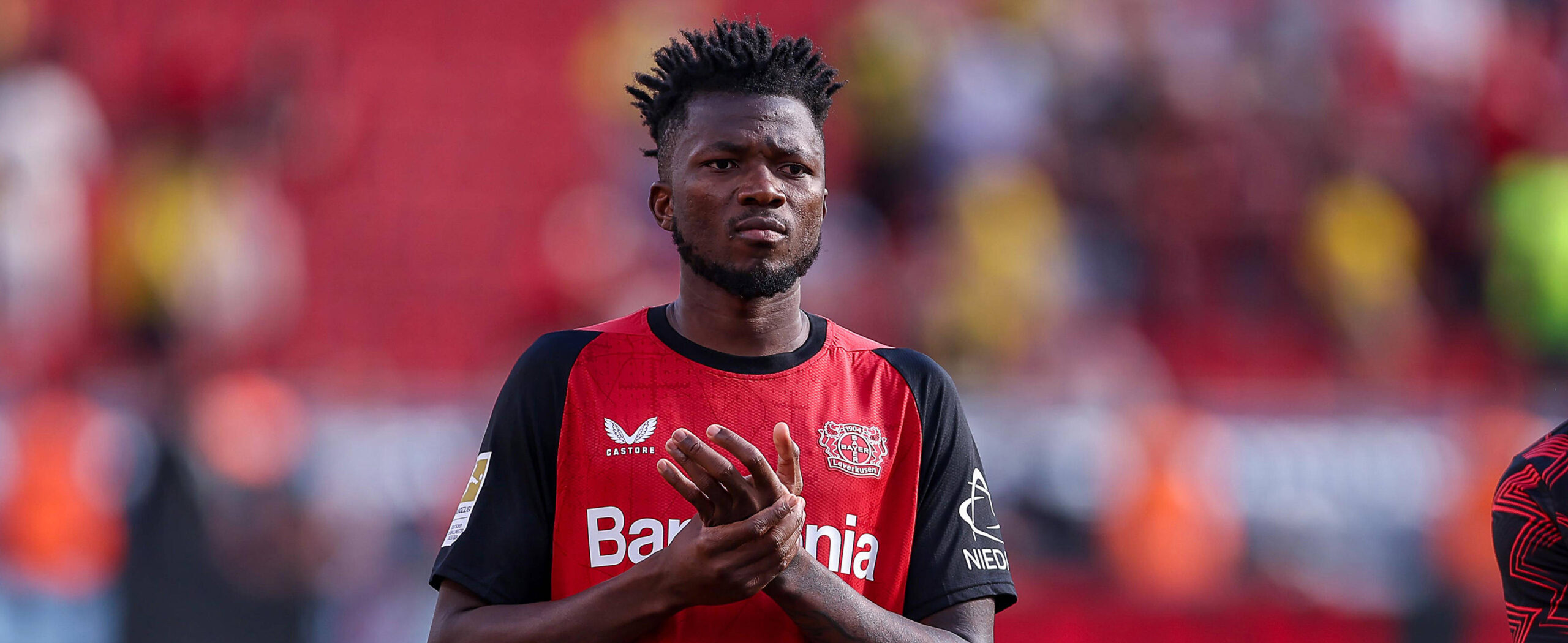 Edmond Tapsoba in action for Leverkusen in 2025