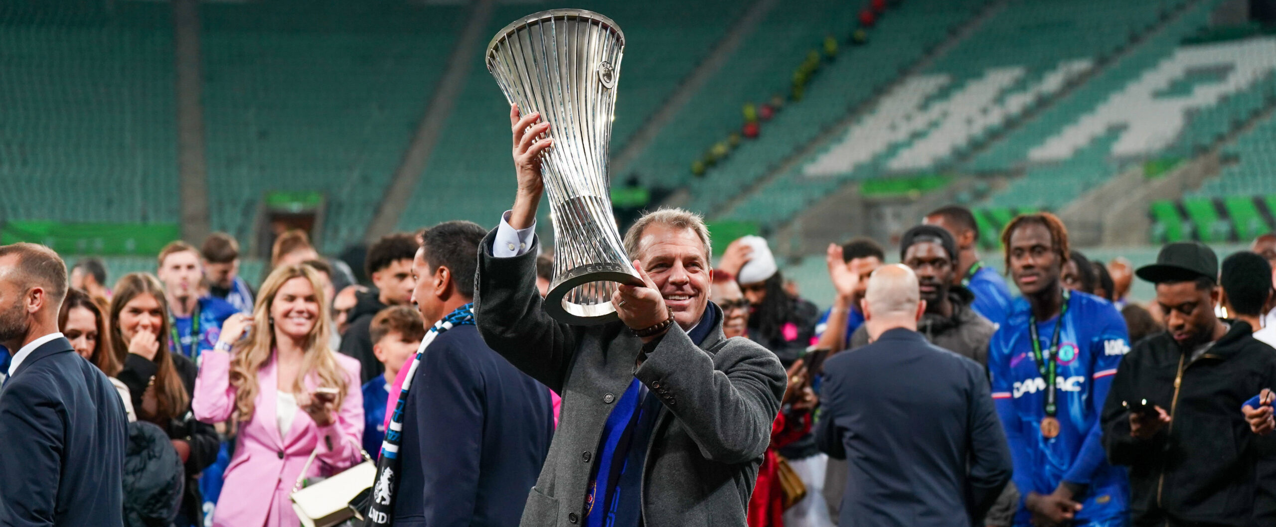 Todd Boehly lifting the trophy of the conference league in 2025