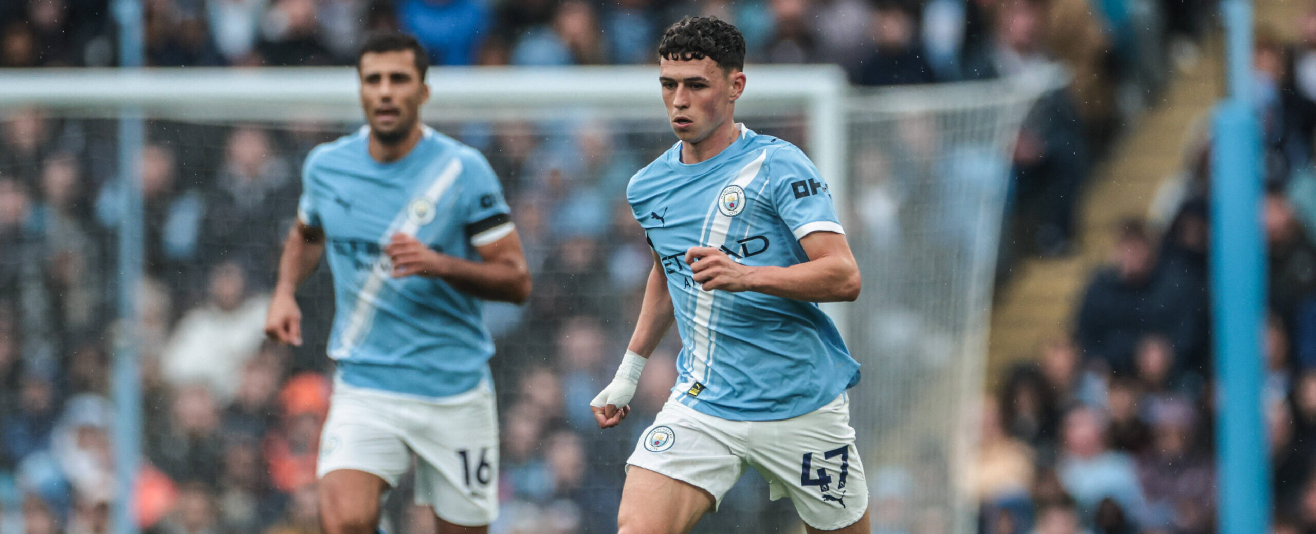 Phil Foden in action for Manchester City against Manchester United in 2025