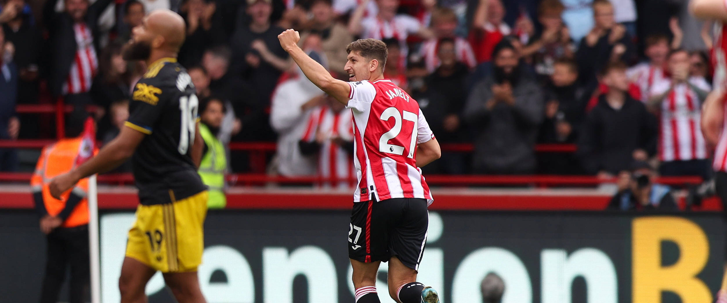 Vitaly Janelt in action for Brentford - celebrating a goal