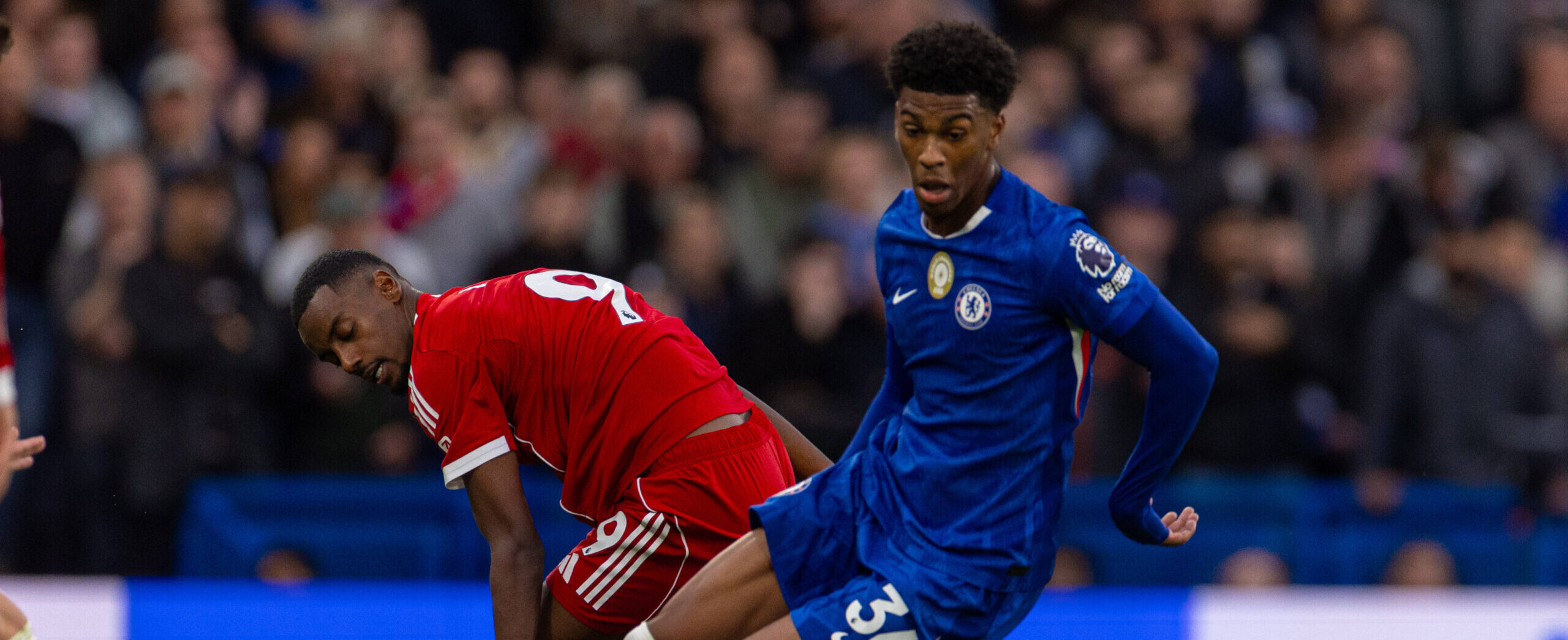 Josh Acheampong in action for Chelsea against Liverpool