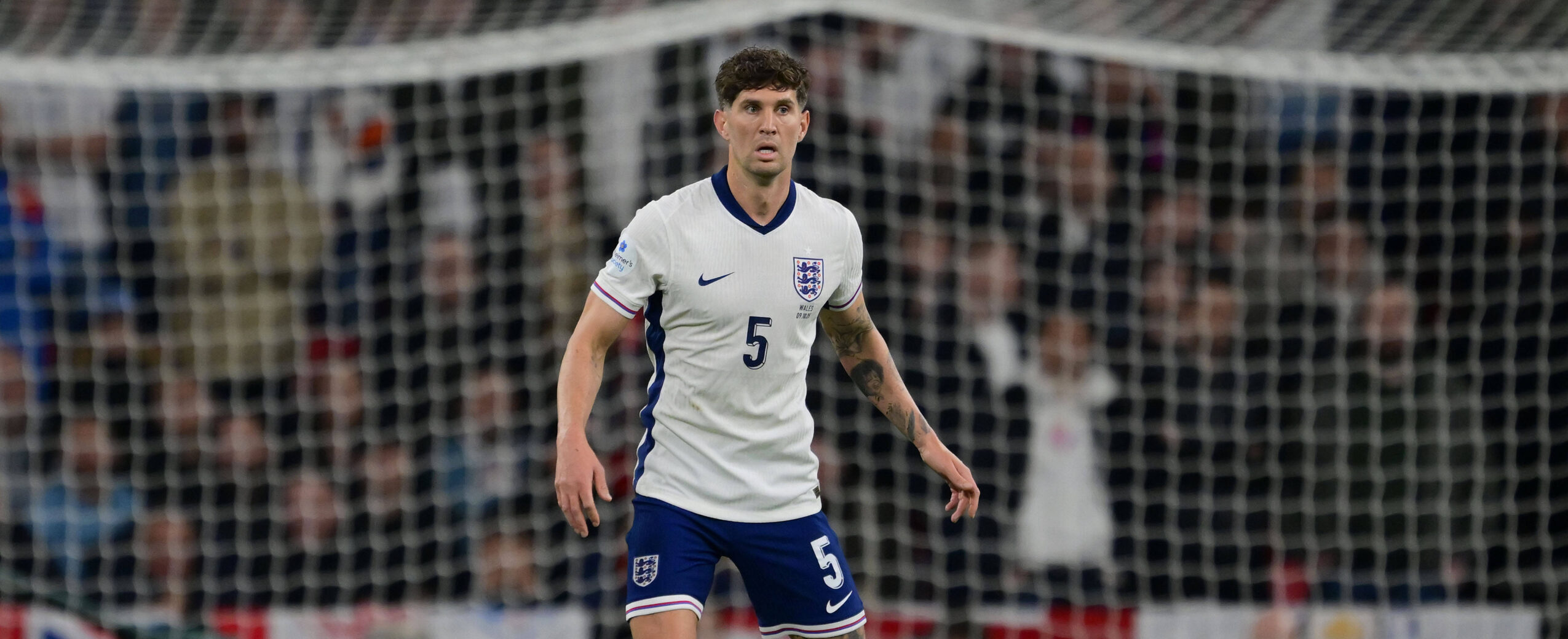 John Stones in action for England in 2025 against Wales