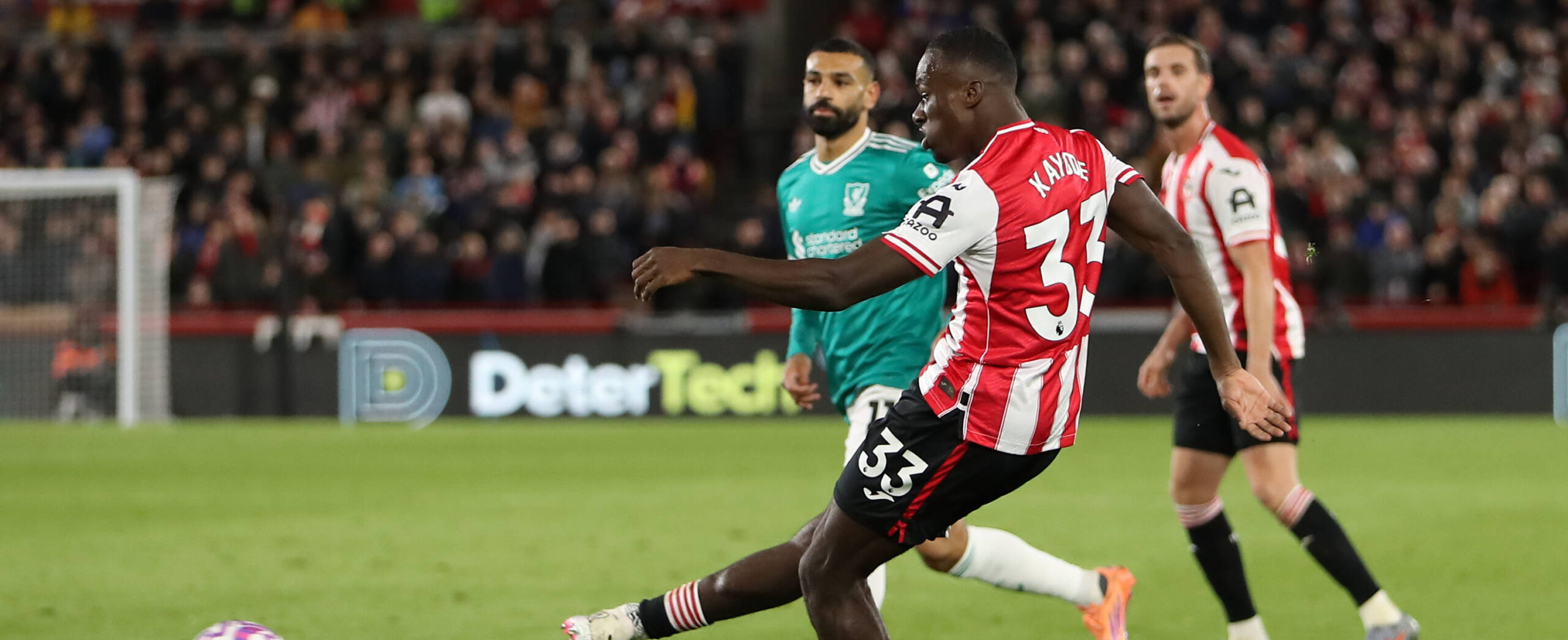 Michael Kayode in action for Brentford in 2025