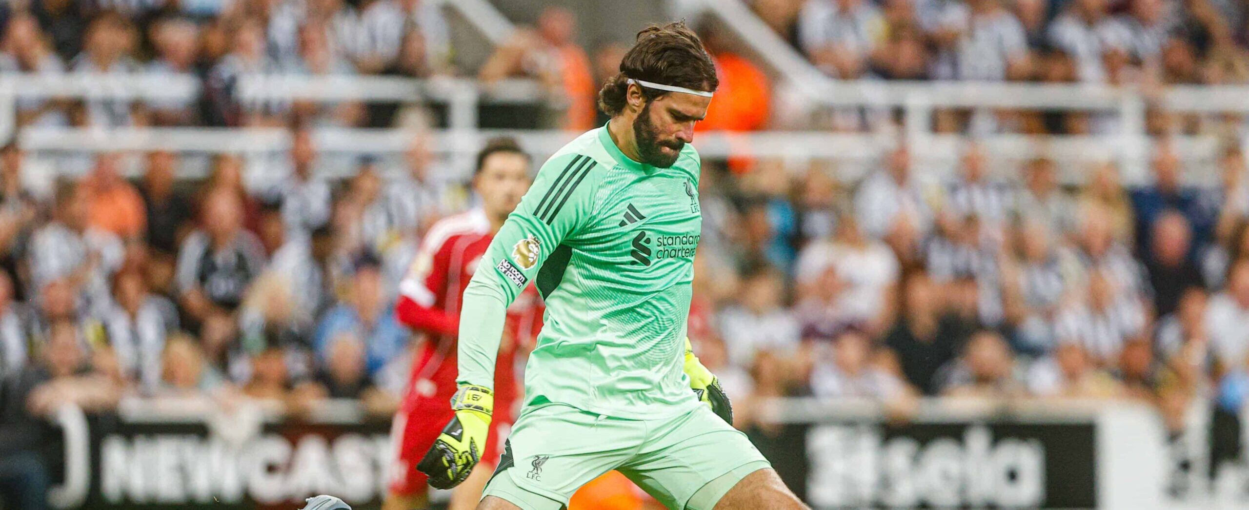 Alisson in action for Liverpool in 2025/26
