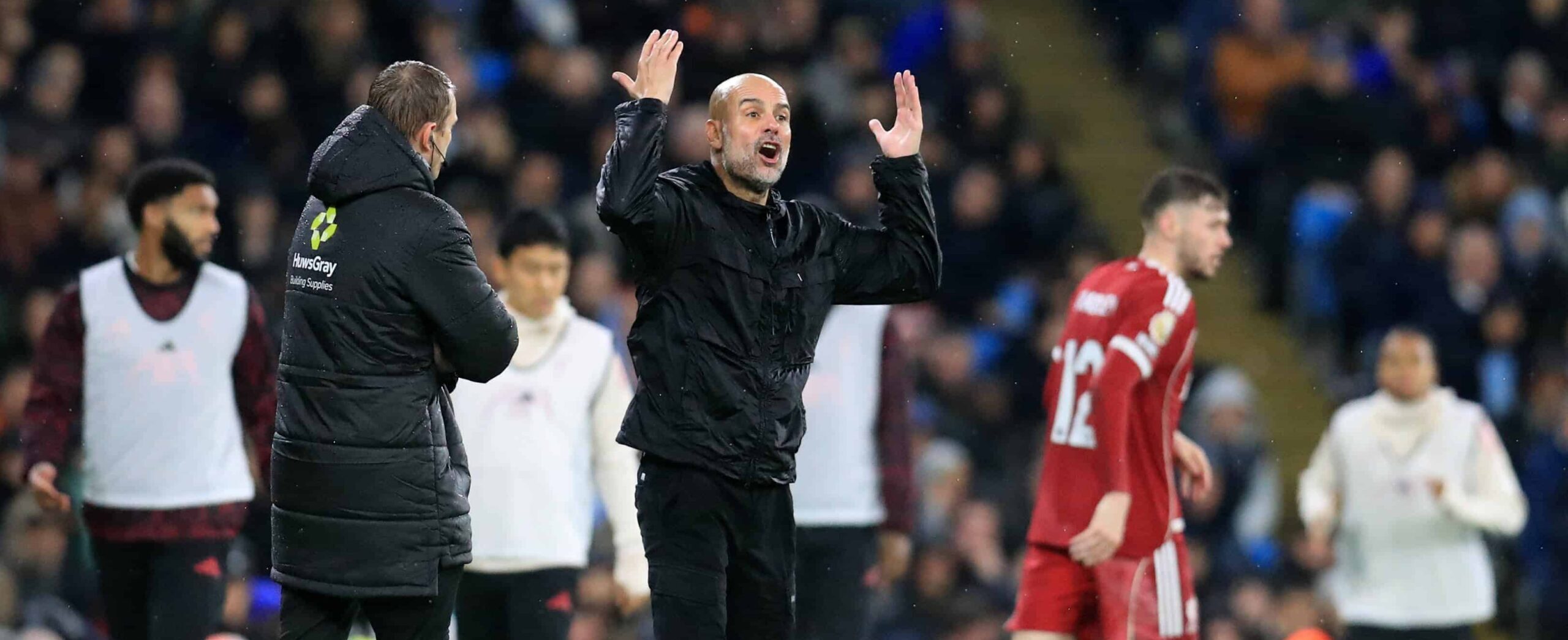 Guardiola in action for Manchester City in the Premier League against Liverpool in 2025