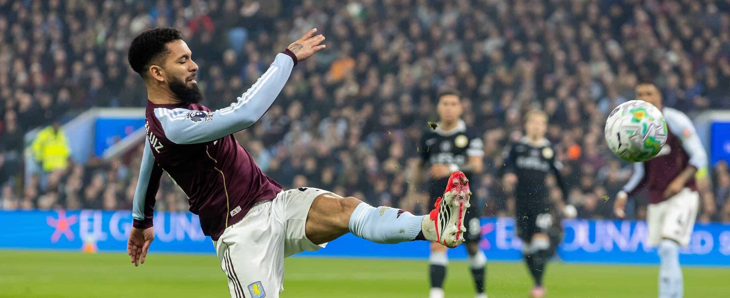 Douglas Luiz in action for Aston Villa in 2026 against Chelsea