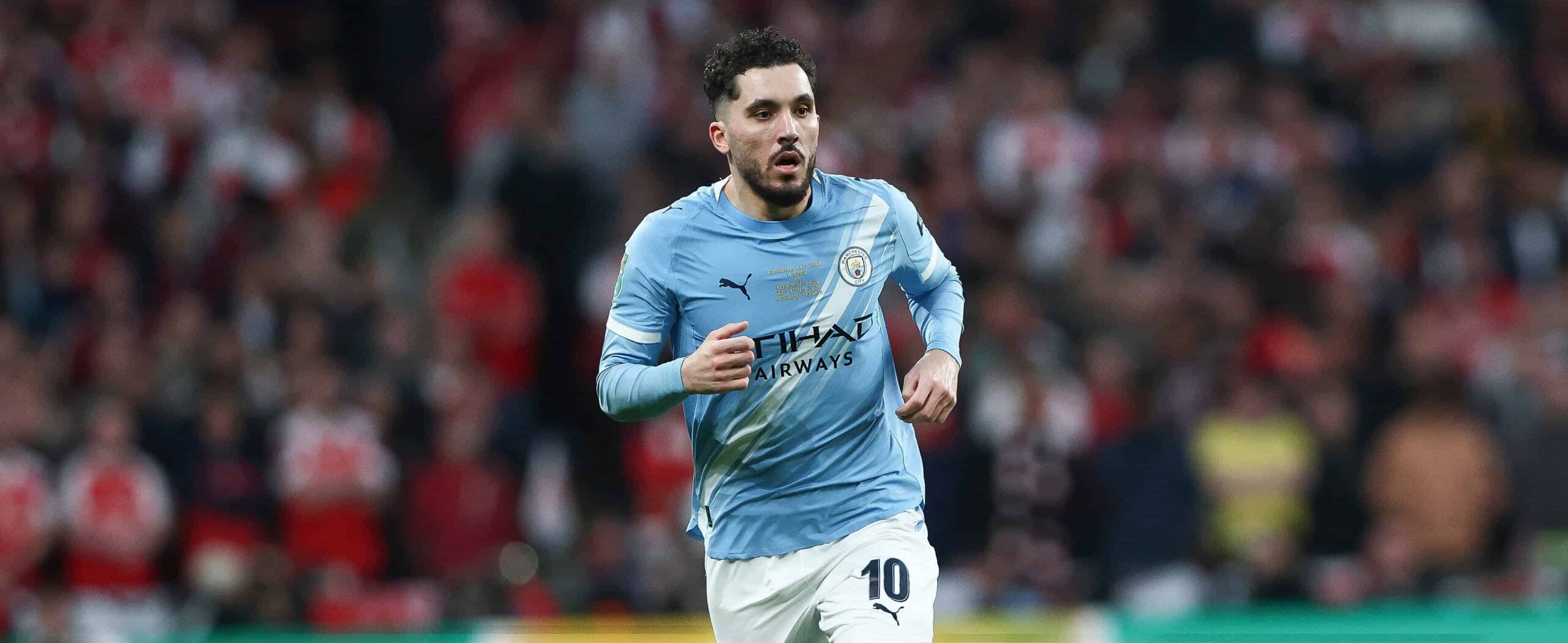 Rayan Cherki in action for manchester city in 2026
