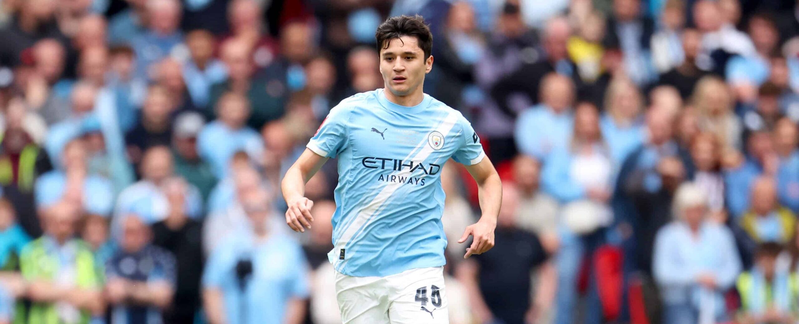 Abdukodir Khusanov in action for City in 2026